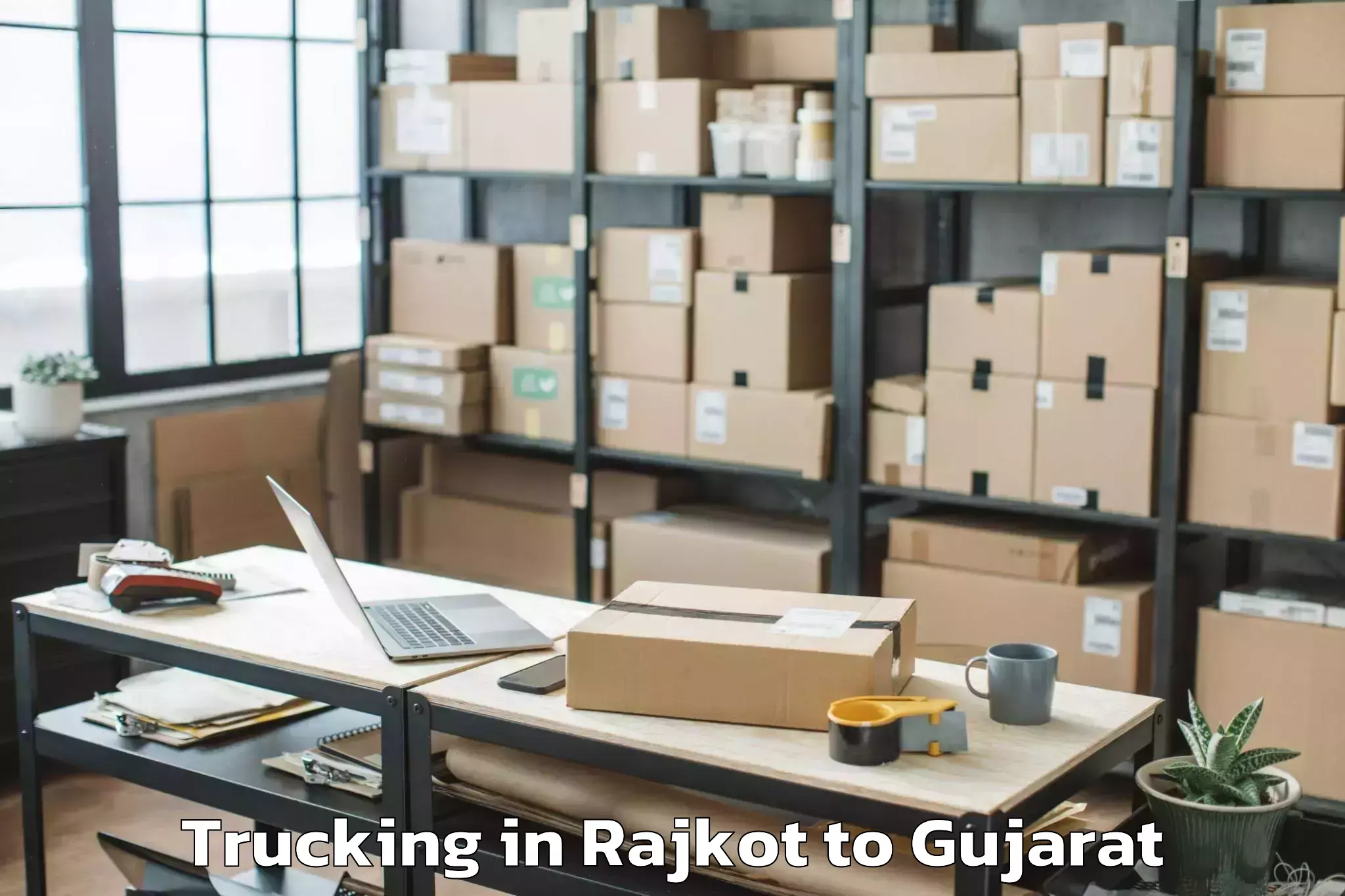 Book Rajkot to Ahmedabad Airport Amd Trucking Online